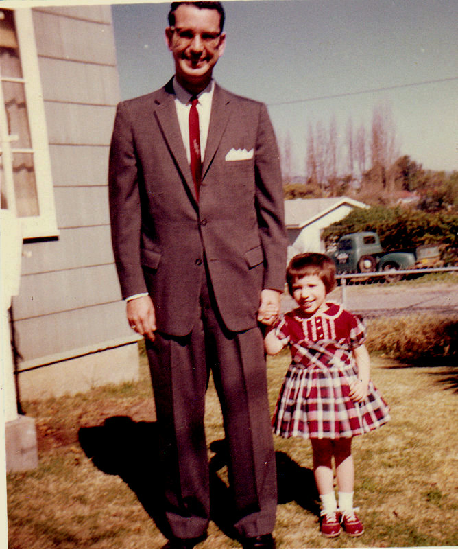 Carolyn as a child with her father